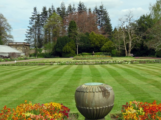 Striped lawn with statuary